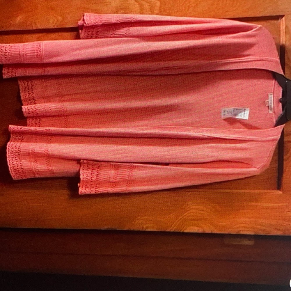 Pink cardigan sweater